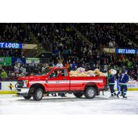Maine Mariners pick up toys from their Teddy Bear Toss