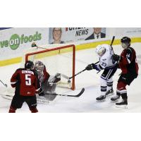 Vancouver Giants goaltender Trent Miner stops a shot against the Victoria Royals