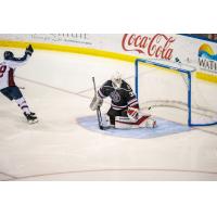 Ian McNulty of the Tulsa Oilers scores against the Rapid City Rush