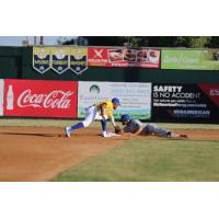 Alay Lago of the Sioux Falls Canaries makes the tag at second