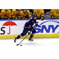 Forward Ben Freeman skating for the University of Connecticut