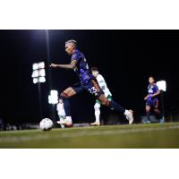 Seattle Sounders FC midfielder Leo Chu vs. the Portland Timbers in preseason action in Tucson, AZ