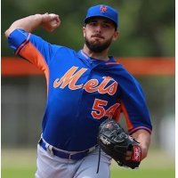 Casey Delgado pitching for the New York Mets in spring training